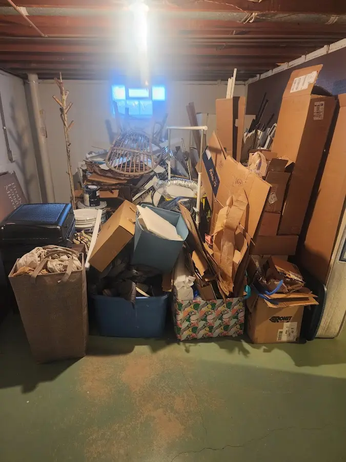 Roll-off dumpster container at job site for Construction Dumpster Rental in East Niles